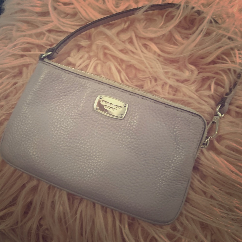 Purple Michael Kors wristlet